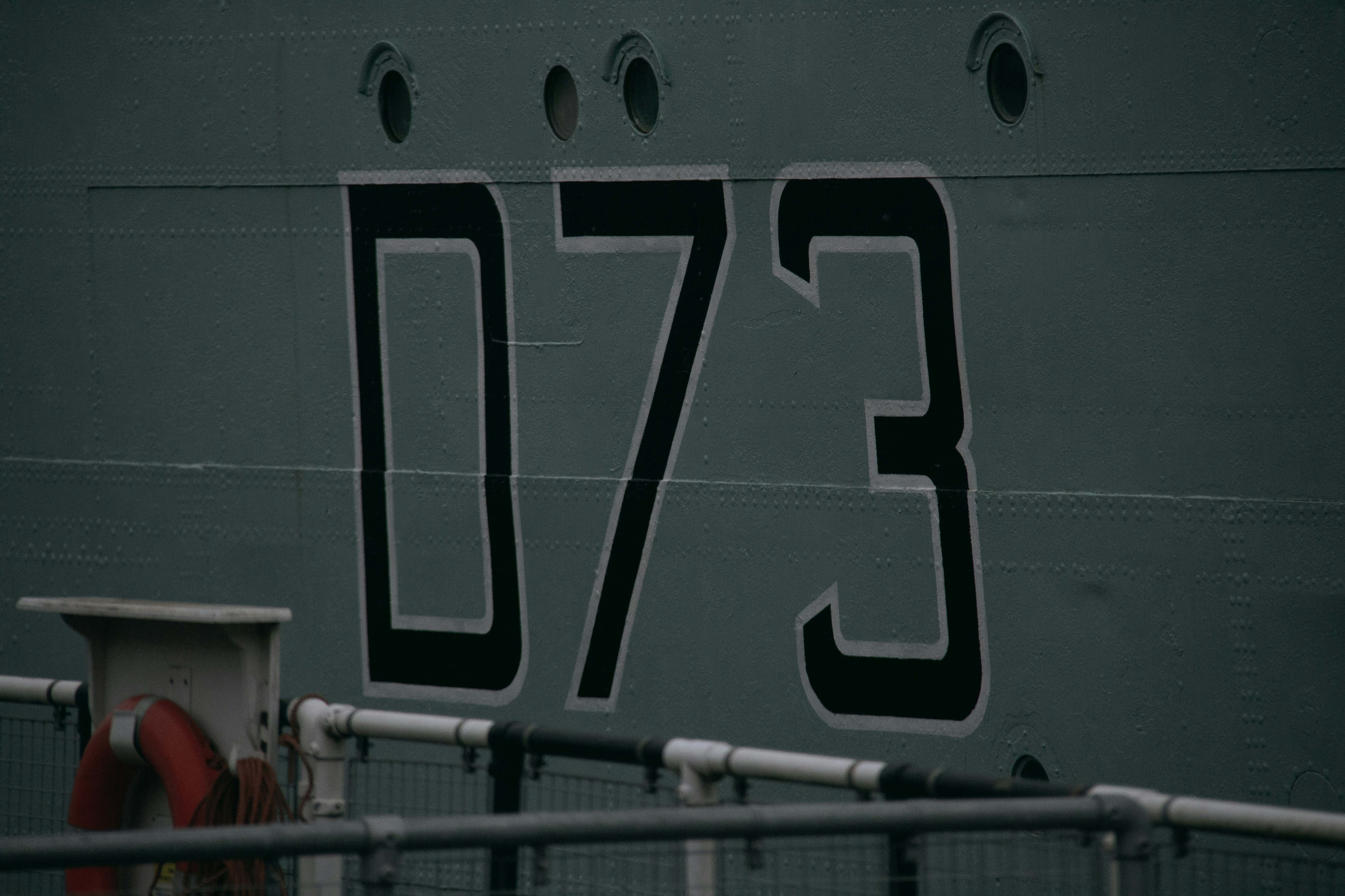 a large ship with the number 37 on it's side
