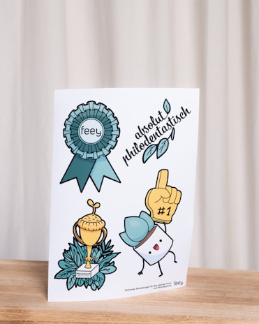 A colorful flashcard showing an English word paired with a vivid illustration to aid memory.