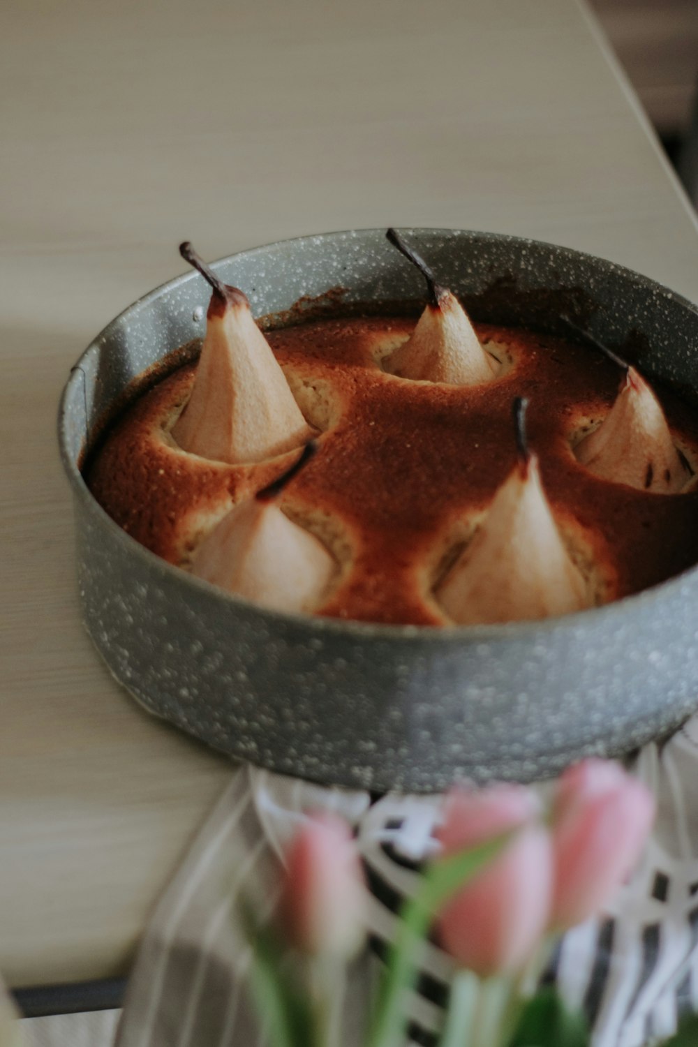 a metal pan filled with food on top of a table