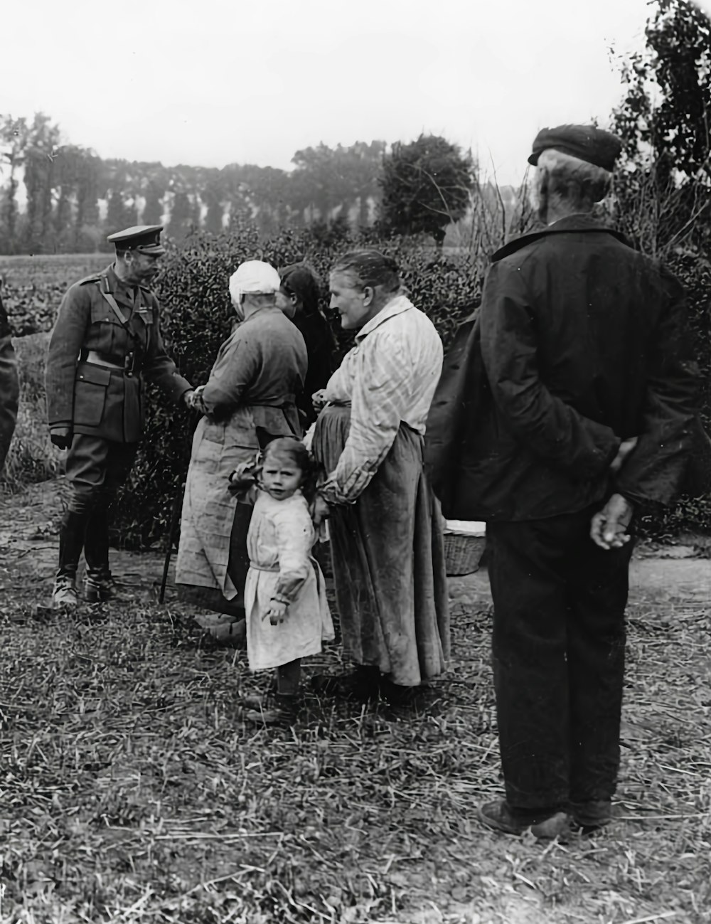 a group of people standing next to each other