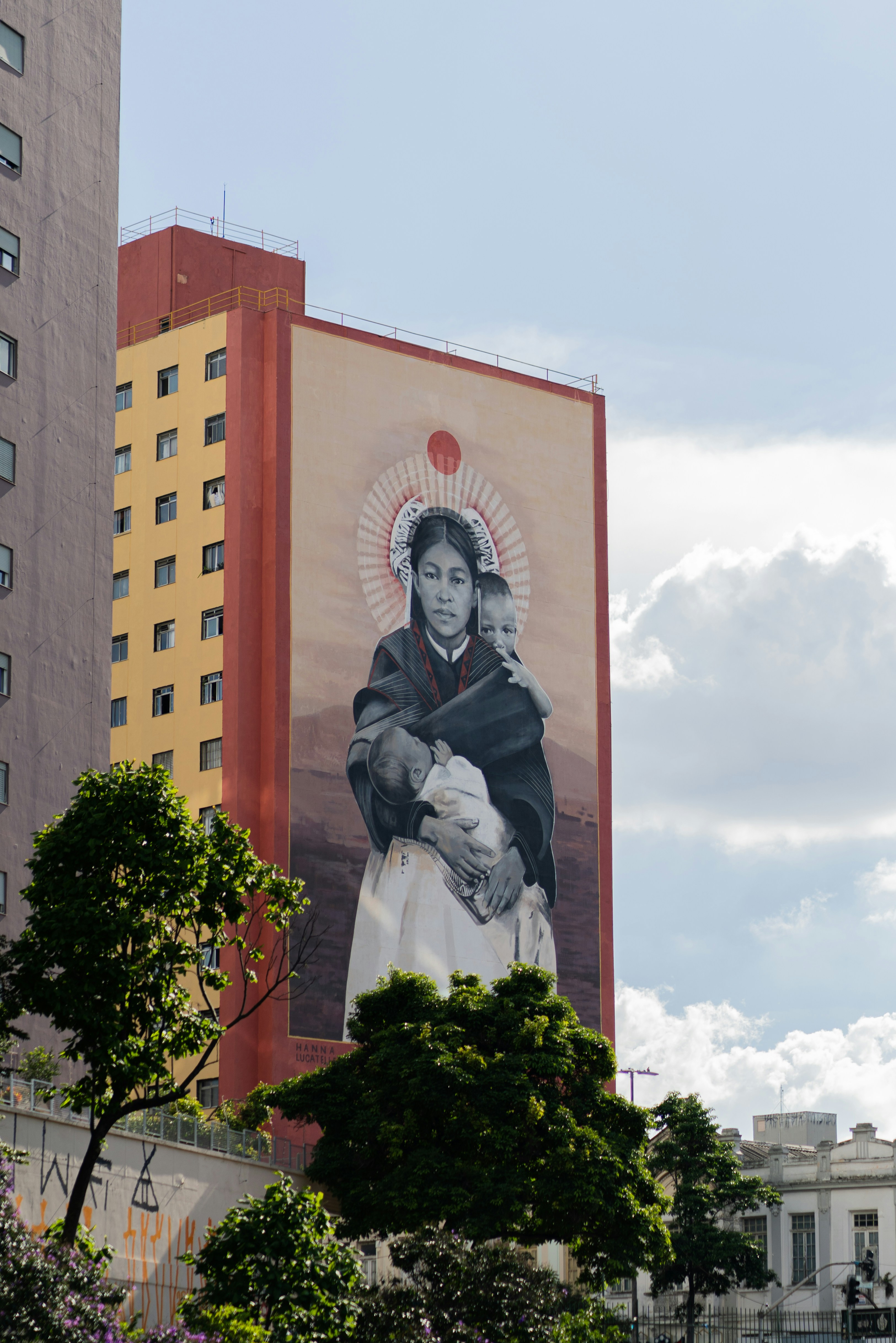A large mural on the side of a building photo – Free Building Image on ...