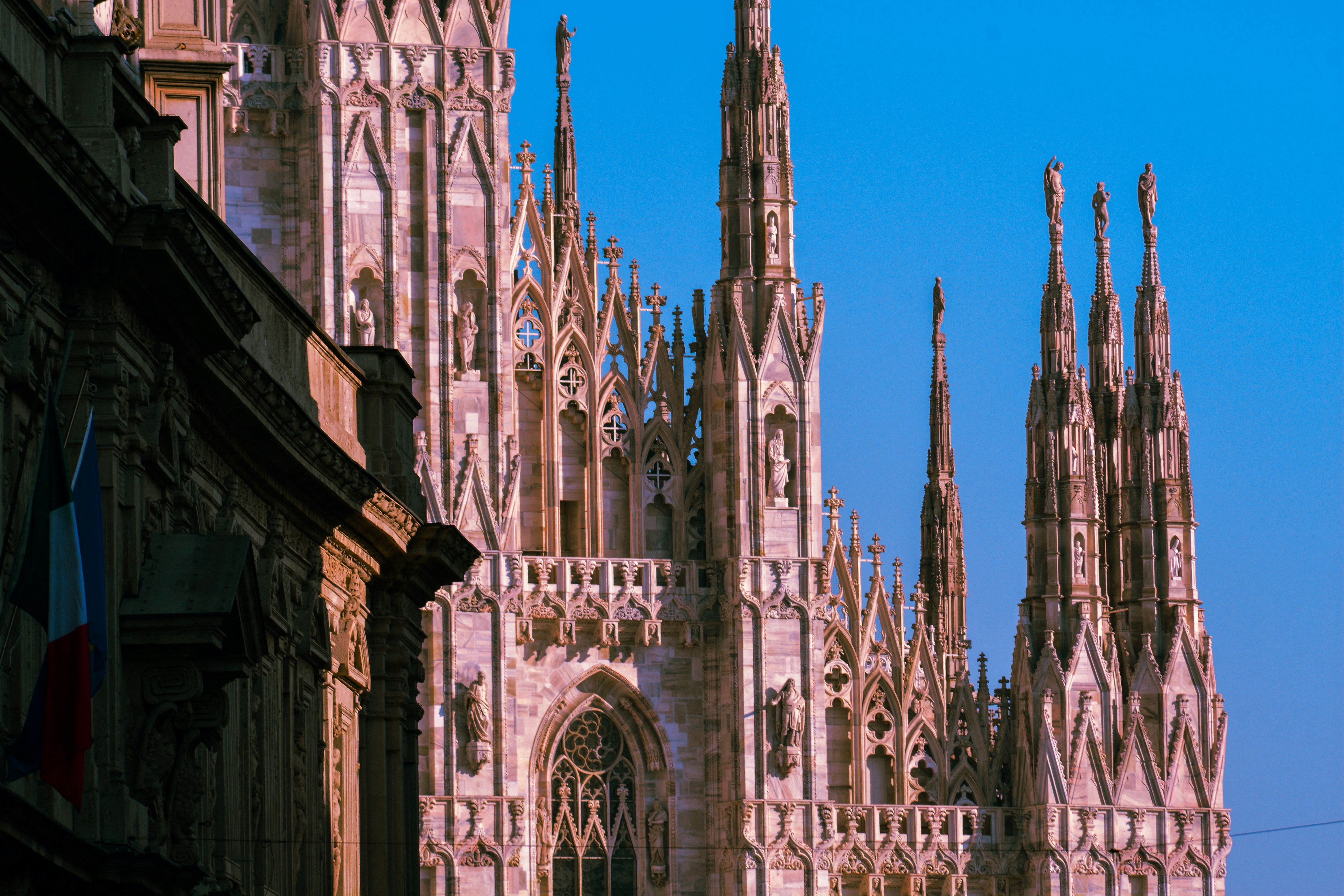 a very tall cathedral with a clock on it