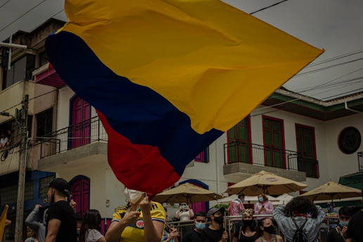 A vibrant street scene in Martinique during a local election campaign.