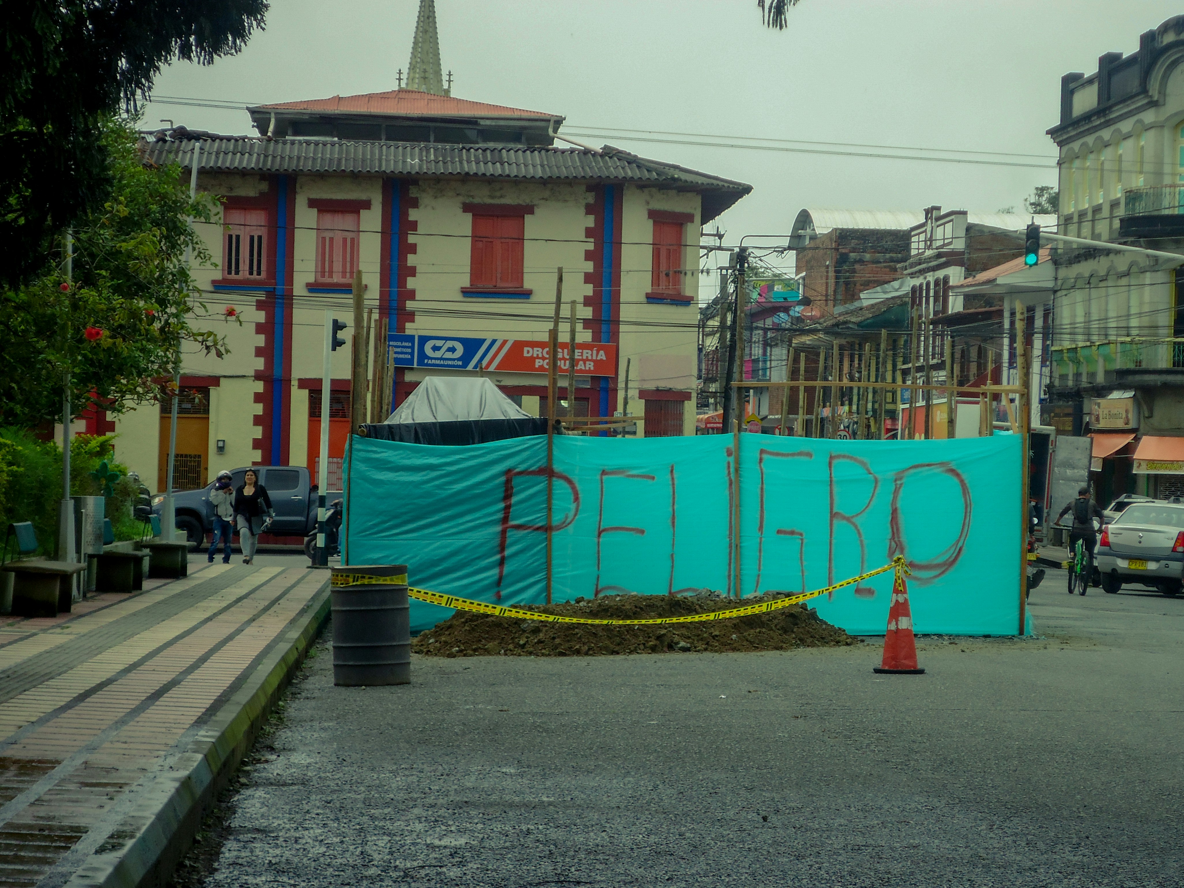 a sign that is on the side of a road