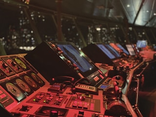 a control room filled with lots of monitors