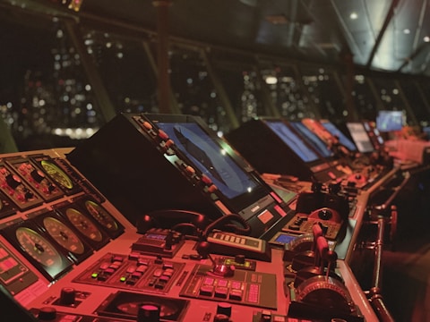 a control room filled with lots of monitors