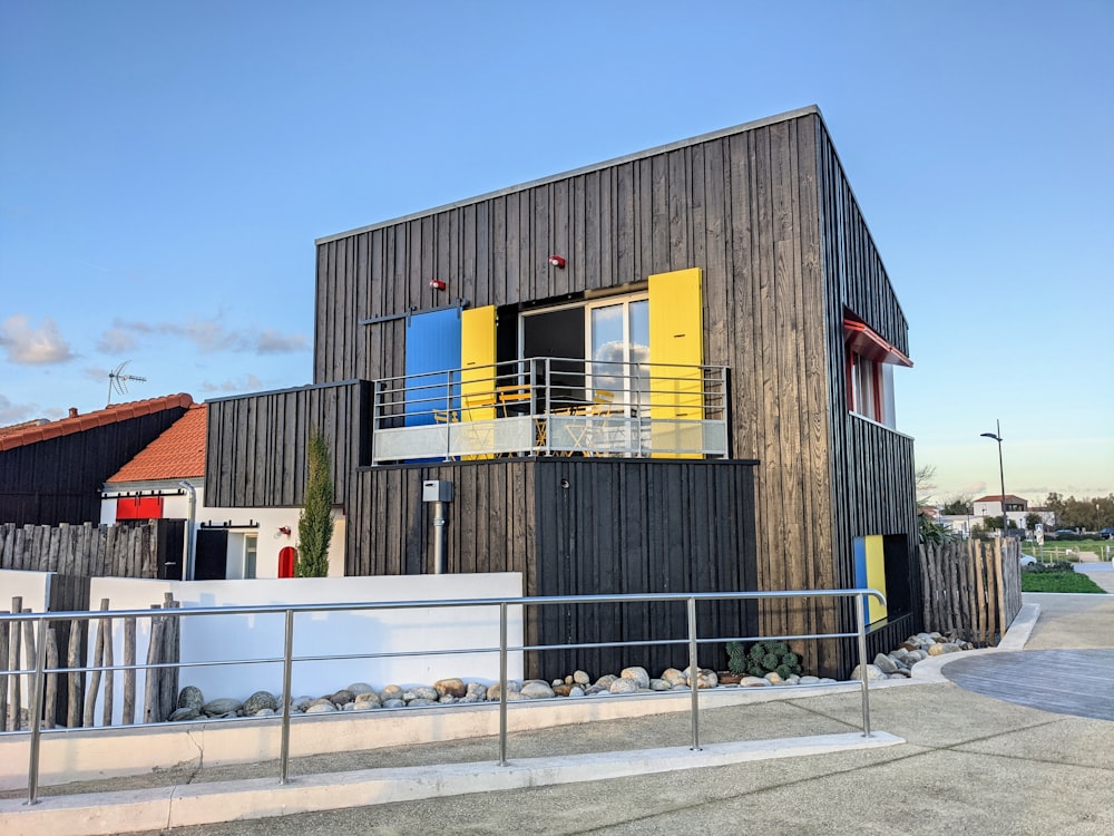 a building with a yellow and blue window