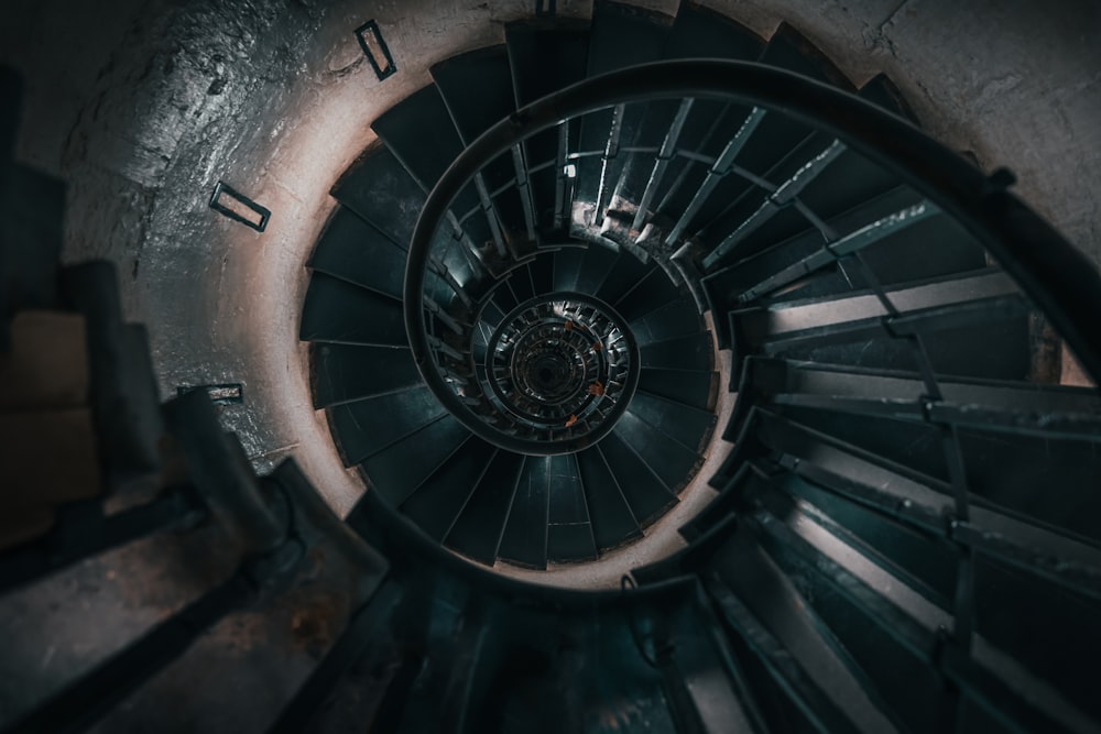 a spiral staircase in a concrete building