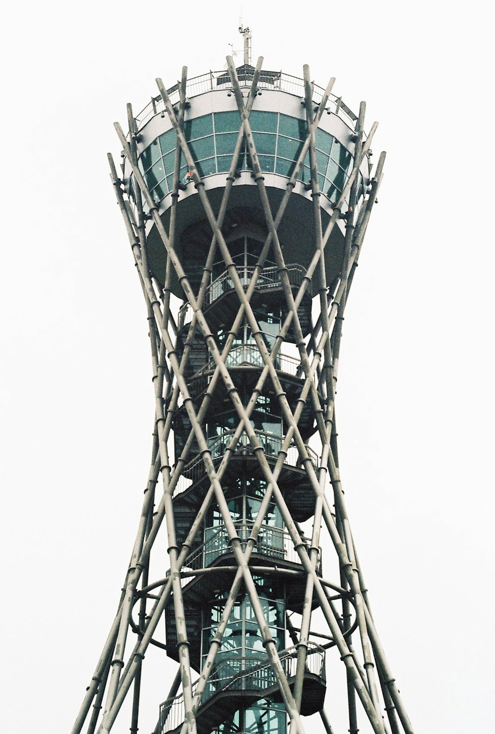 a tall tower with a clock on the top of it