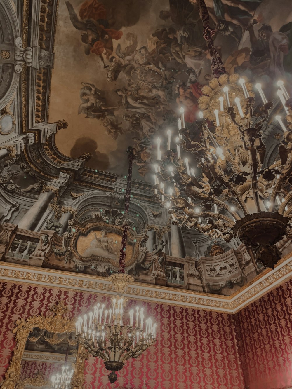 a chandelier hanging from the ceiling of a room