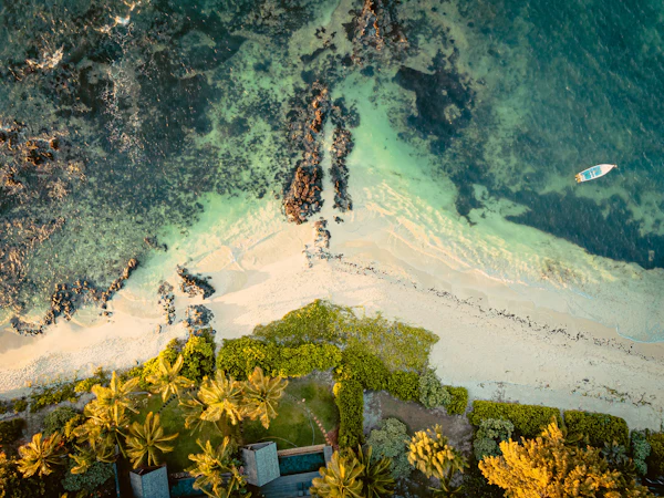 Aerial view of beach and turquoise shallows, Mauritius