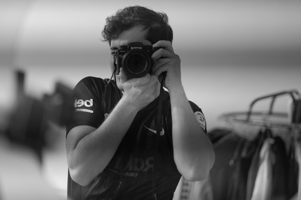 A male photographer taking a photo