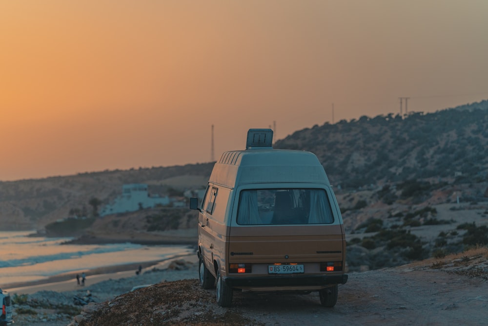 a van is parked on the side of the road