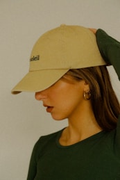 a woman with a hat on her head