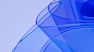 a close up of a blue vase with a sky background
