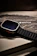 A happy customer unboxing a sleek smartwatch from Techzone Store.