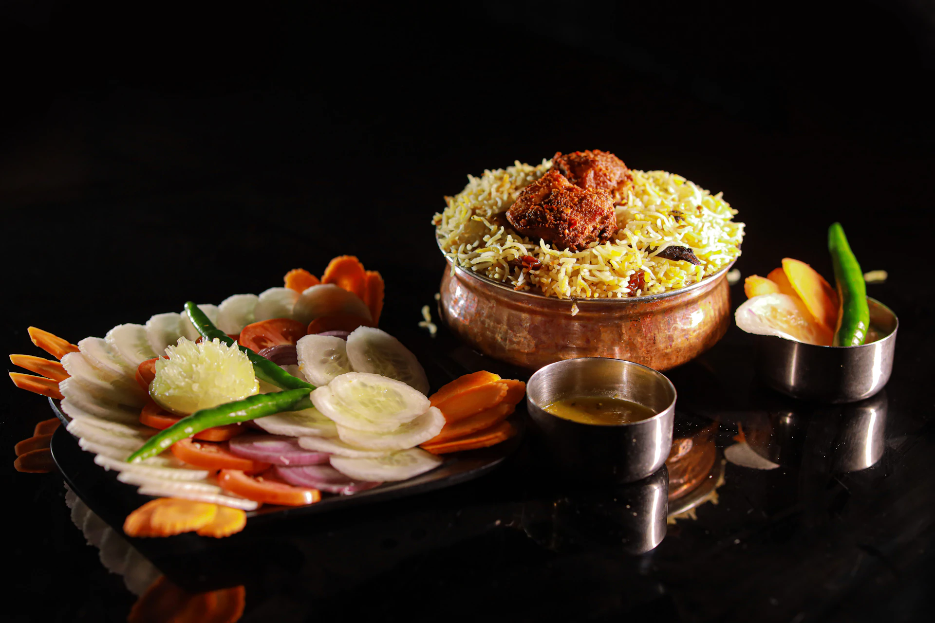 a bowl of food on a black table