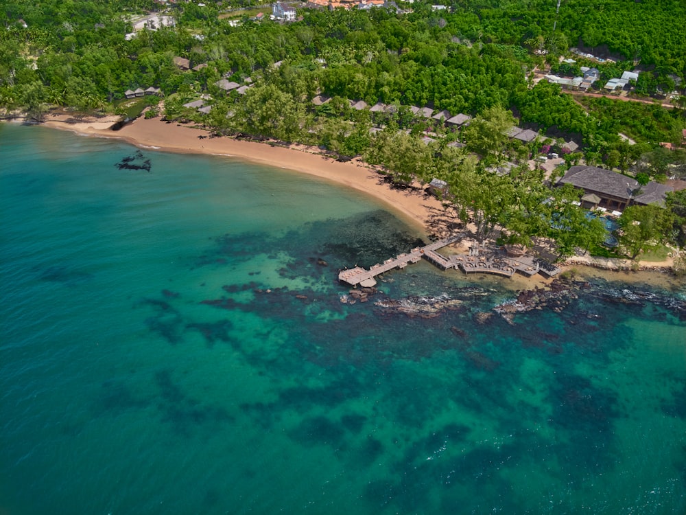 an aerial view of a resort on a tropical island