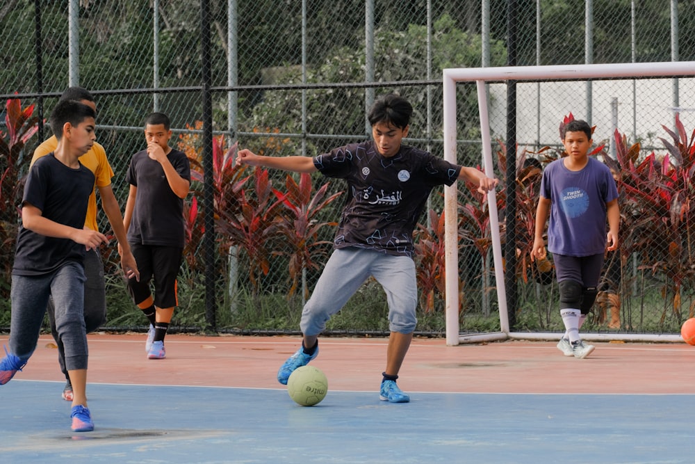 a group of young men playing a game of soccer