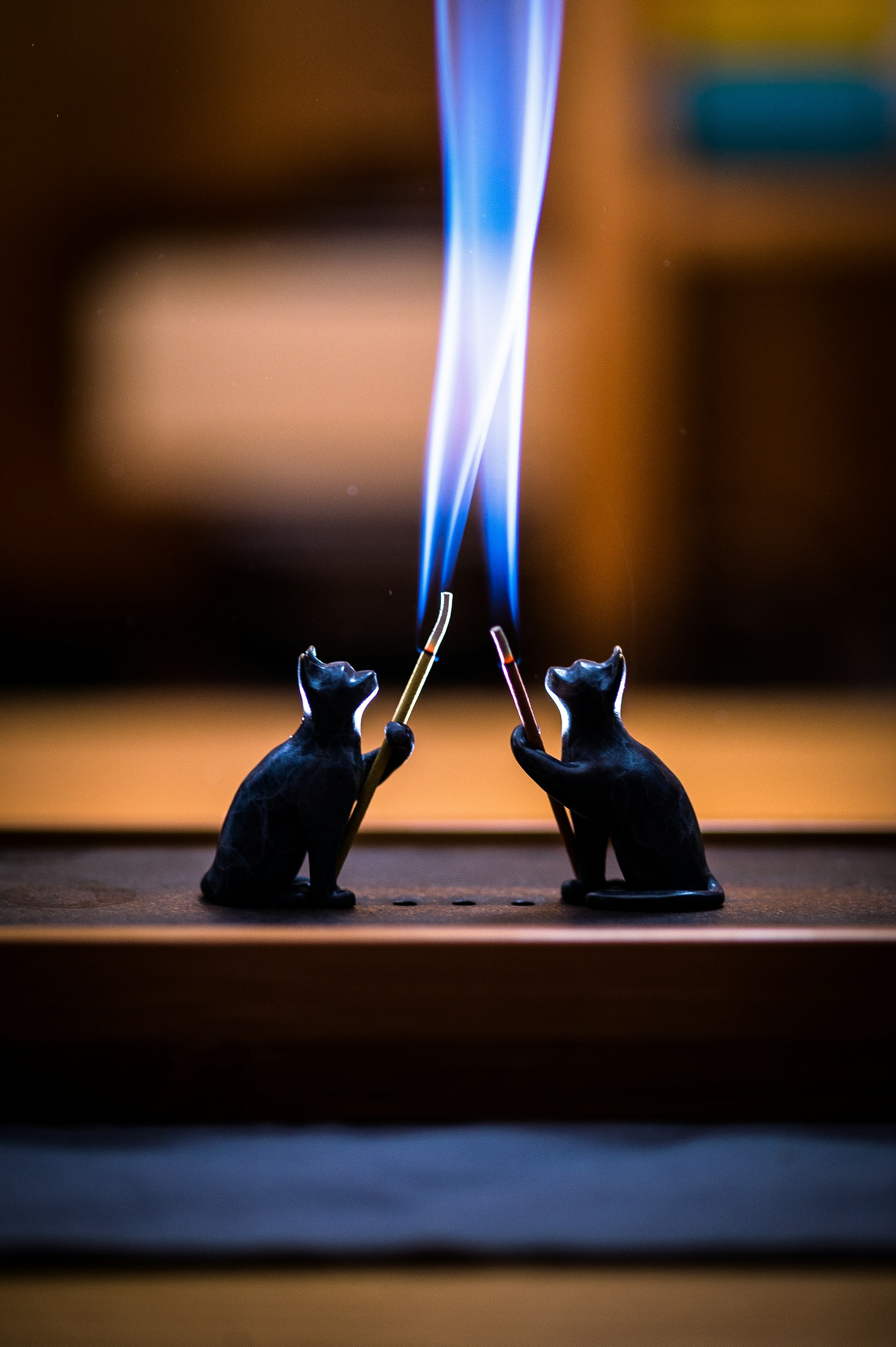 a couple of small figurines sitting on top of a table
