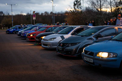Votiapp cars lined up ready to serve the community on a bright morning.