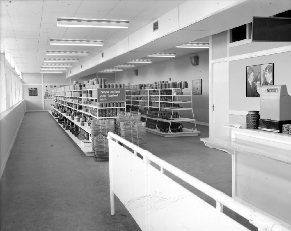 a black and white photo of a library