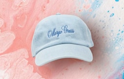 a blue cap with the word cheap brass embroidered on it