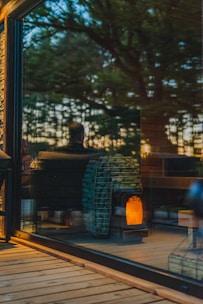 A cozy mountain house warmly lit by a pellet stove burning clean, natural fuel.