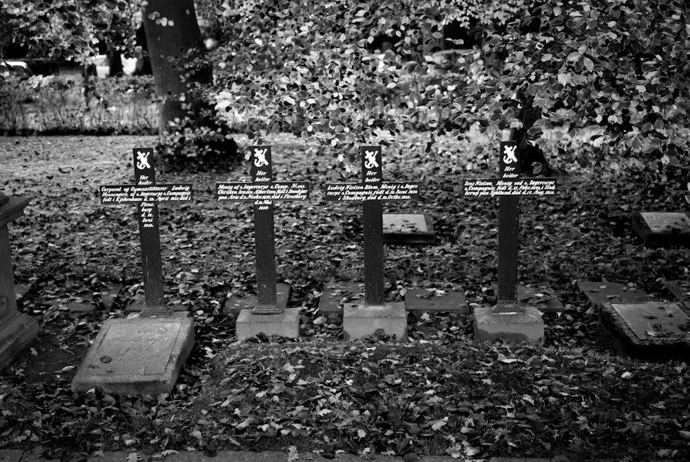 a black and white photo of a cemetery