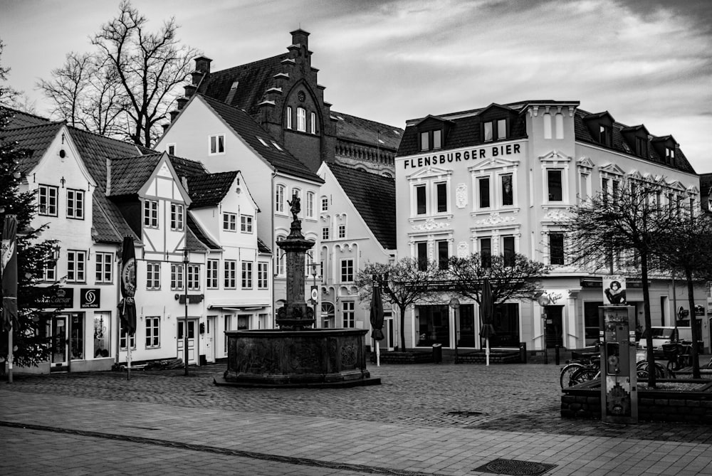 a black and white photo of a town square