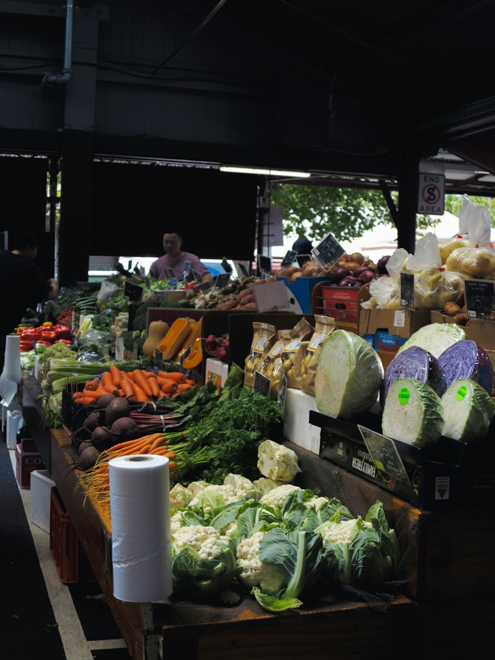 a farmers market filled with lots of fresh produce