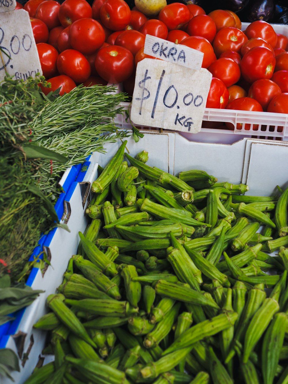 a bunch of vegetables that are on display