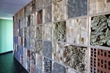 a wall with a bunch of tiles on it