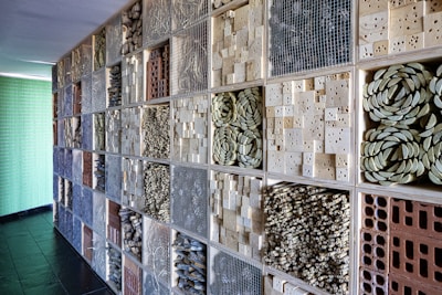 a wall with a bunch of tiles on it
