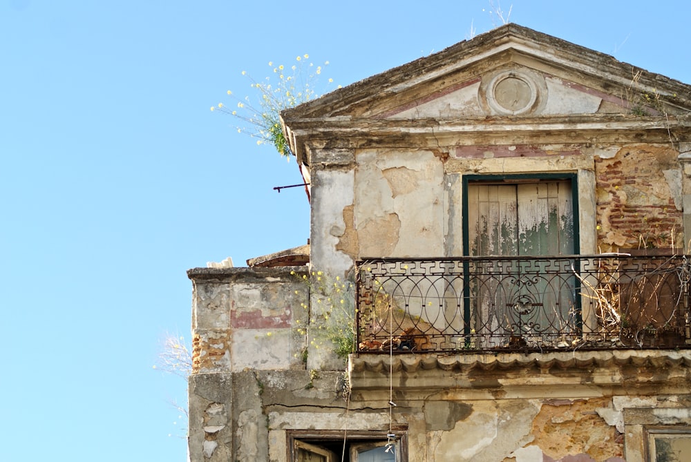 an old building with a balcony and balconies