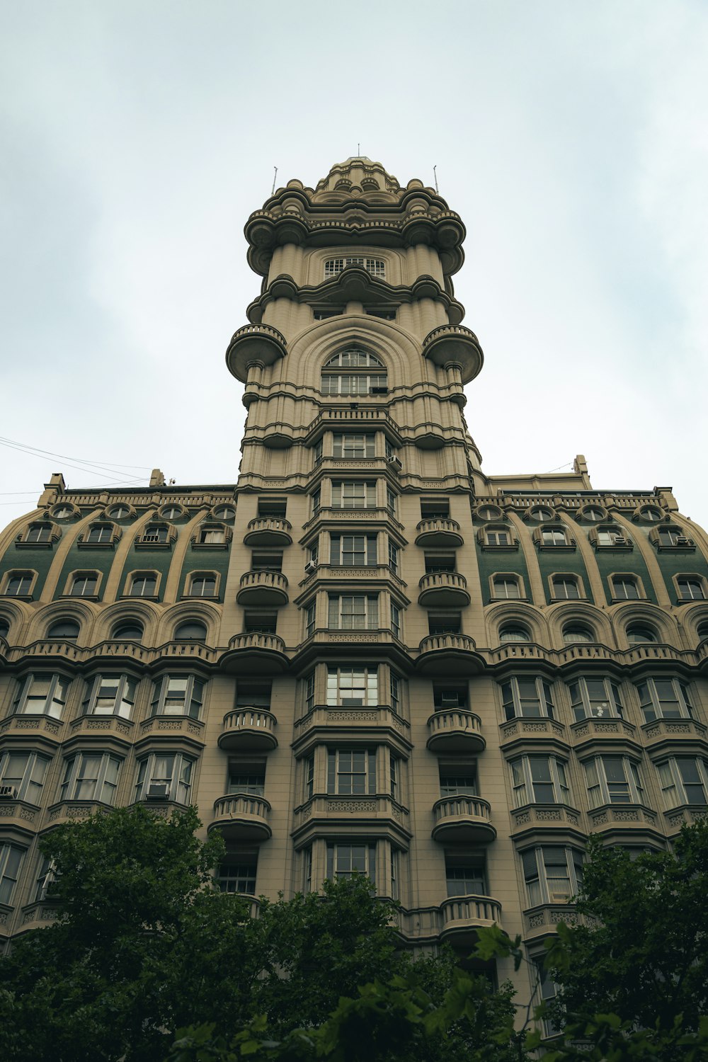 a tall building with a clock on the top of it