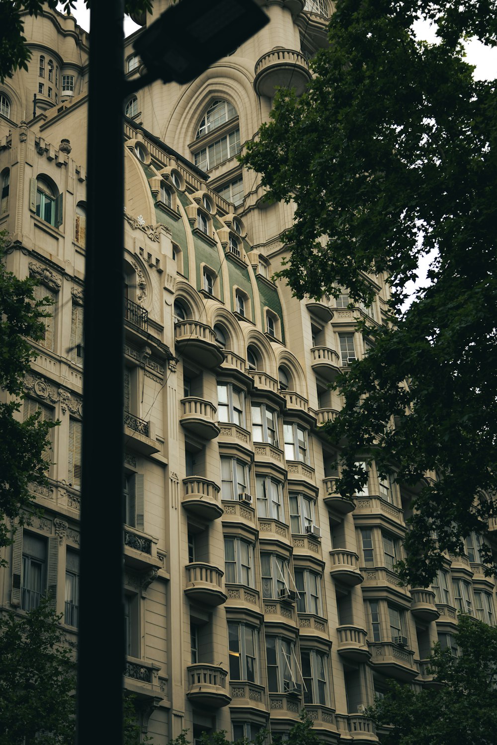 a tall building with a clock on the front of it