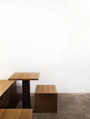 Metal dining table and benches crafted with sleek, clean lines.