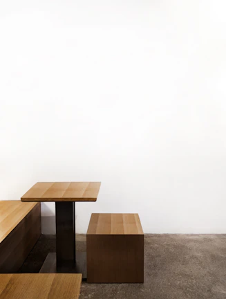 Metal dining table and benches crafted with sleek, clean lines.