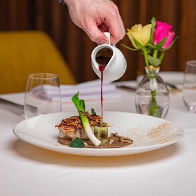 Artfully plated fine-dining dish on a restaurant table