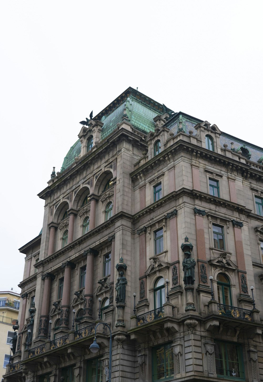 a large building with a clock on the top of it