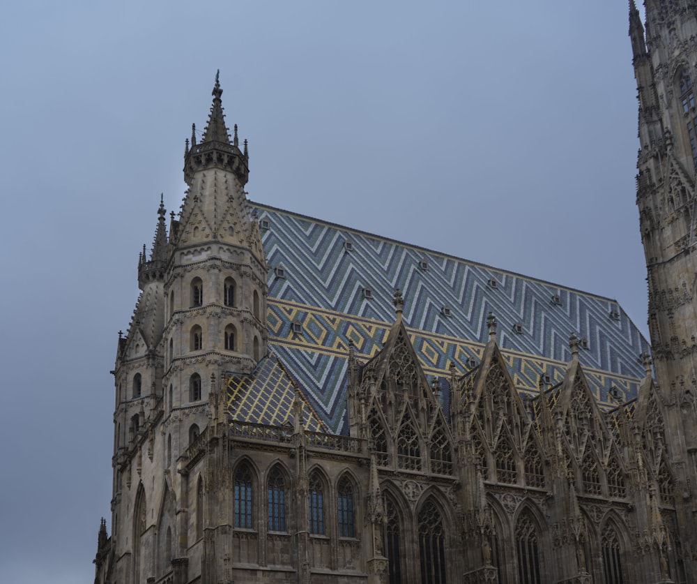 a large cathedral with a clock on the front of it