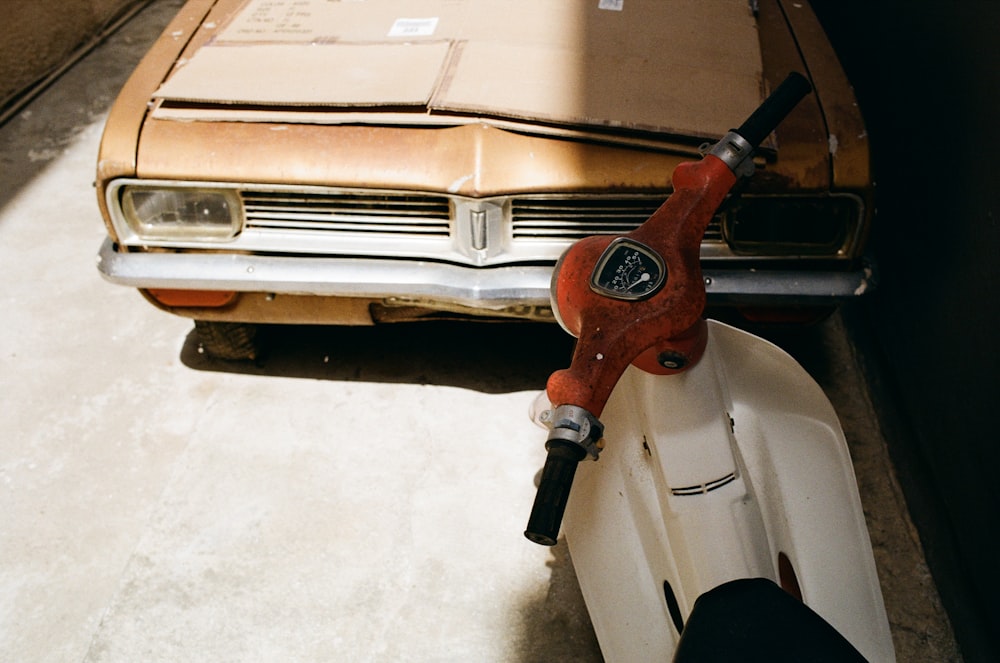 a car is being worked on by a machine