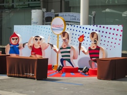 a group of people standing on top of a stage
