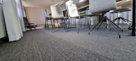 A modern conference room with elegant laminate flooring that adds warmth and professionalism to the space.