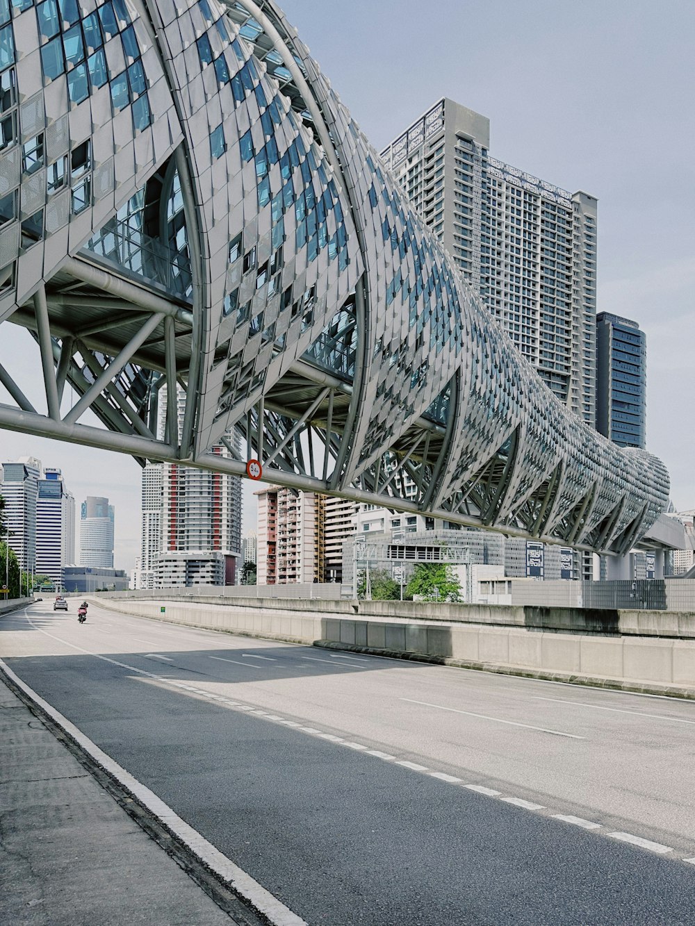 a very tall building with a curved roof