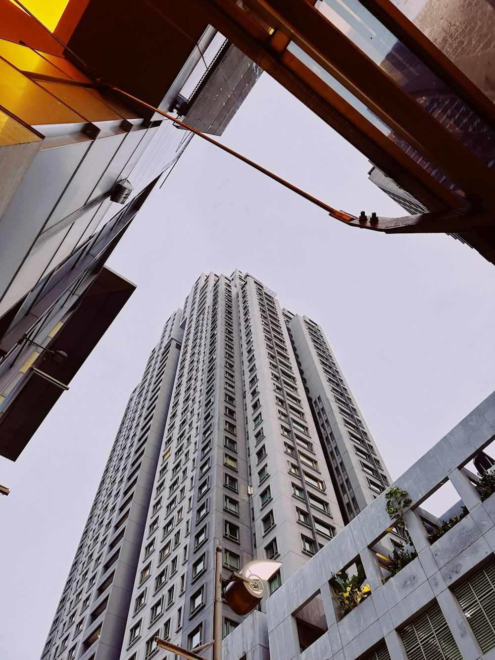 looking up at a tall building in a city