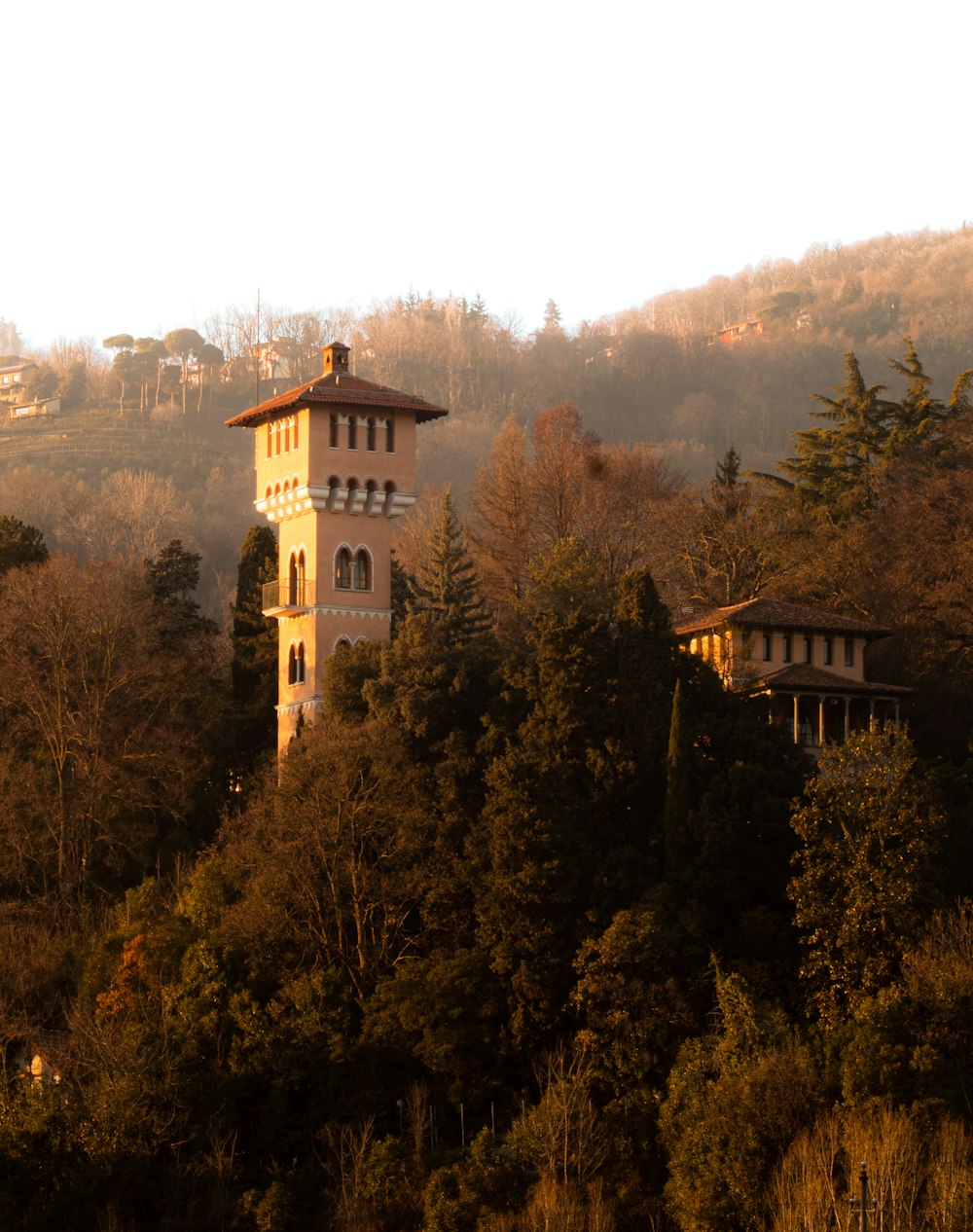 a tall tower with a clock on the top of it