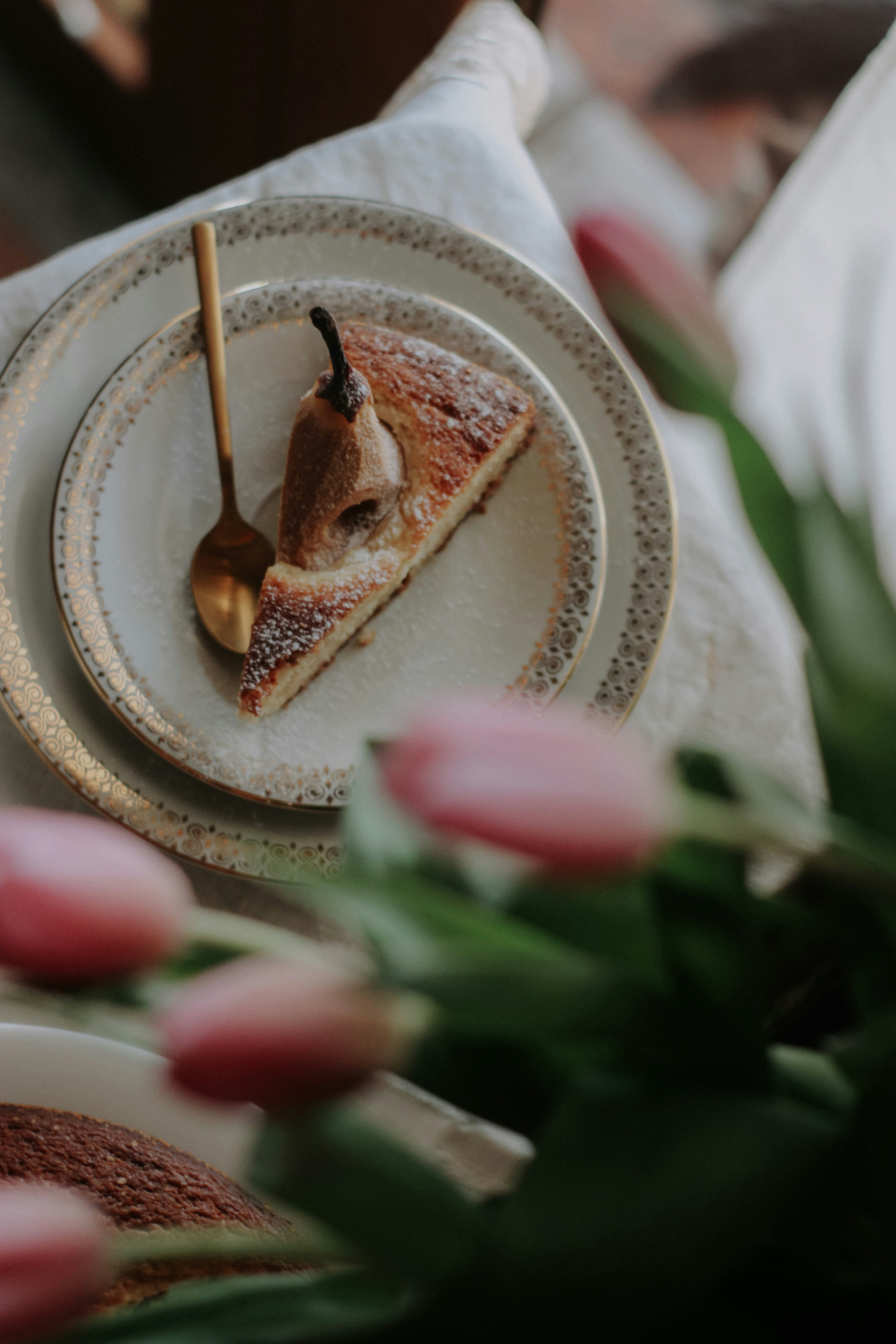 a piece of pie on a plate with a spoon
