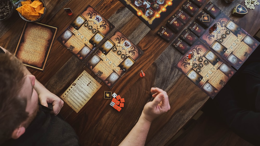 a man is playing a board game on a table